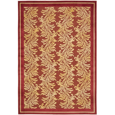 Tapis rouge à motif floral Plume