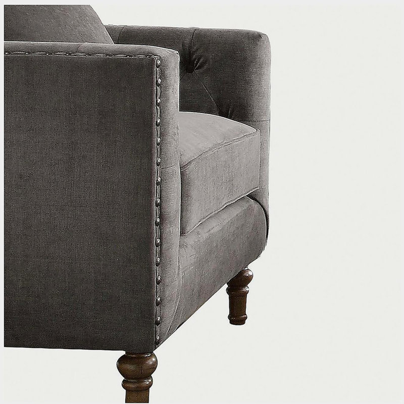 Chaise d'appoint grise avec coussin
