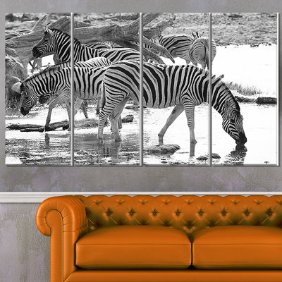 «Herd of Zebra Black and White», ensemble de 4 reproductions de photos sur toiles tendues