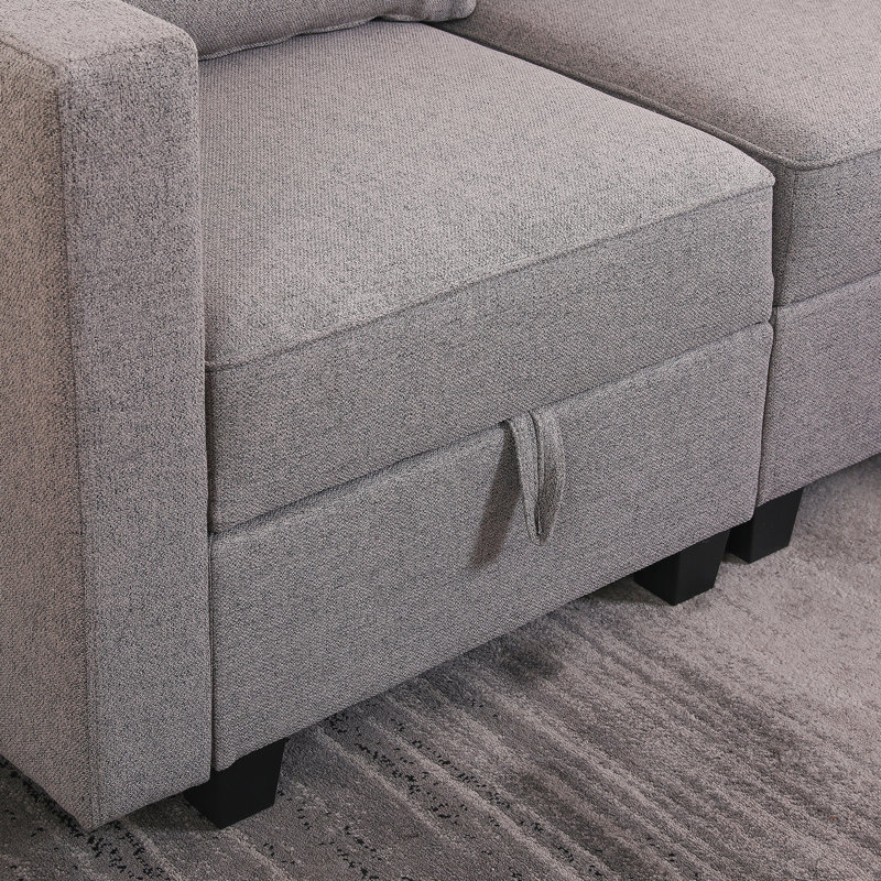 Canapé modulaire polyvalent avec méridienne convertible et repose-pieds, idéal pour des sièges flexibles et beaucoup de rangement dans tout espace de vie.