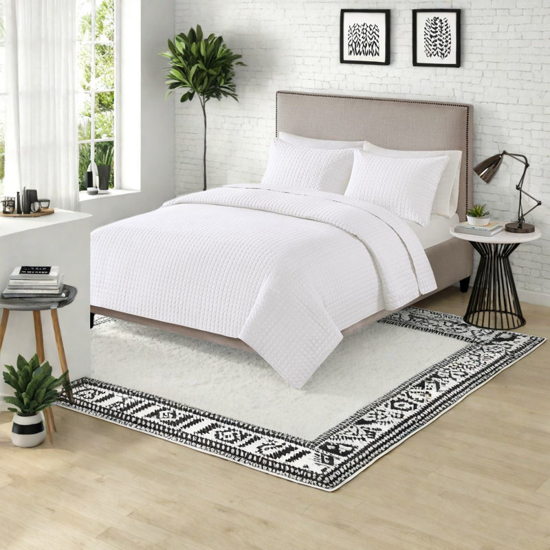 Ensemble de literie réversible blanc, polyester confortable, conception moderne pour la chambre à coucher
