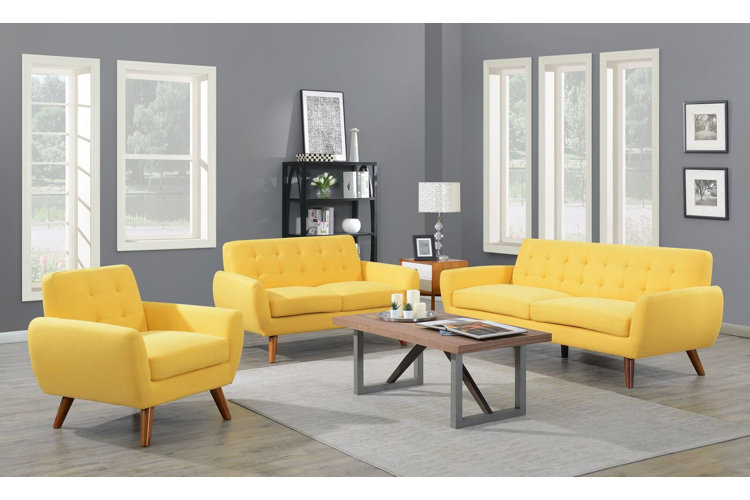 living room with gray walls and yellow sofa, loveseat, and accent chair