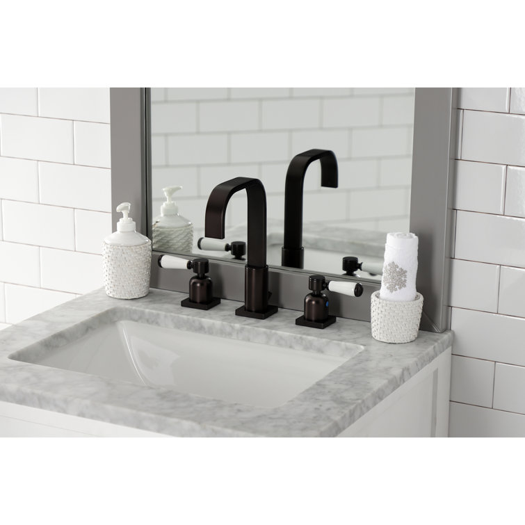Kingston Brass Concord Two-Handle 3-Hole Deck Mount Widespread Bathroom Faucet with Retail Pop-Up Drain