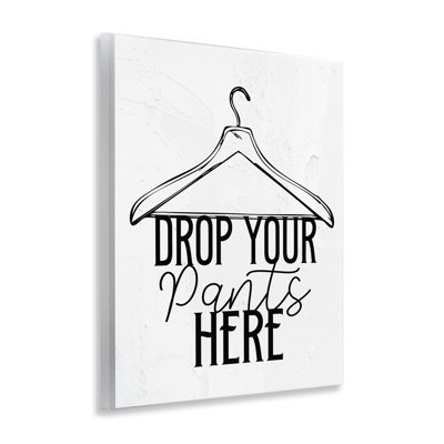 Plaque murale «Drop Pants Here with Hanger», design par Kim Allen