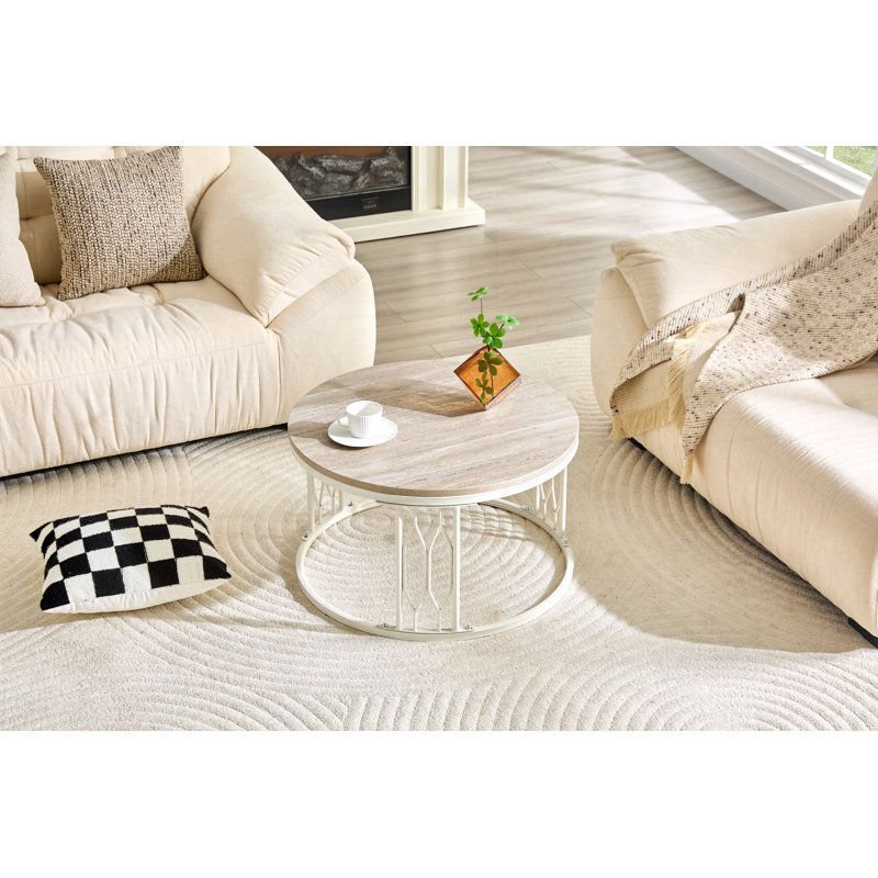 Table basse ronde en panneau de fibres à densité moyenne avec texture effet pierre, style Wabi-Sabi, structure en métal robuste et assemblage facile pour les salons