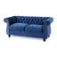 Fauteuil élégant à accoudoirs roulés en velours bleu marine classique avec bordure cloutée et capitonnage profond