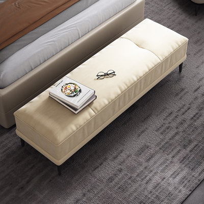 Long banc en tissu beige rembourré moderne