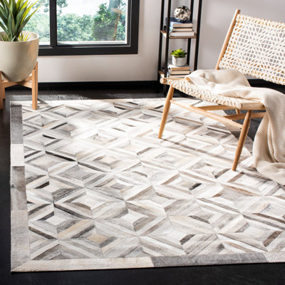 Cartwright Hand Woven Leather Geometric Area Rug