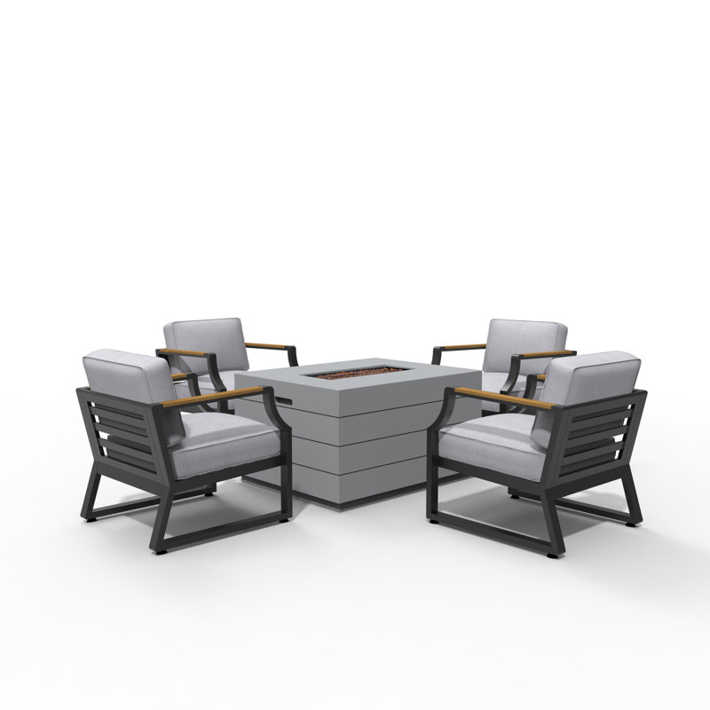Tenslee 4 - Person Patio Dining Set with Rectangular Table , Cushions Included, Black