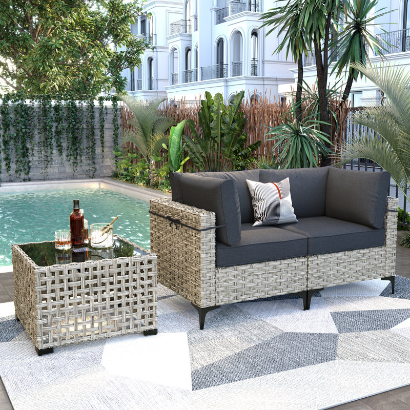 Ensemble de conversation en osier / rotin pour 2 personnes avec table basse lumineuse et coussins Emroy