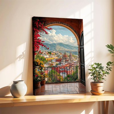 Vue panoramique d'une ville mexicaine à travers un balcon en arche de pierre orné de bougainvilliers. Grande toile tendue sur châssis, idéale pour le salon ou la chambre.