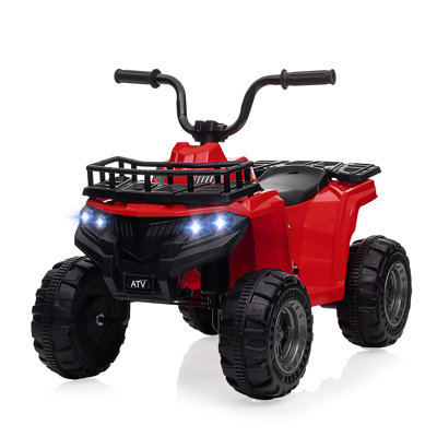 Jouet électrique pour enfant à 4 roues 12V 4 roues avec pneus à traction haute vitesse, vitesse de pointe 1,8 MPH, phares à DEL, lecteur de musique et port USB pour les enfants de 3 à 8 ans