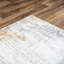 Tapis abstrait ivoire / gris / orange Janeil-1288015103
