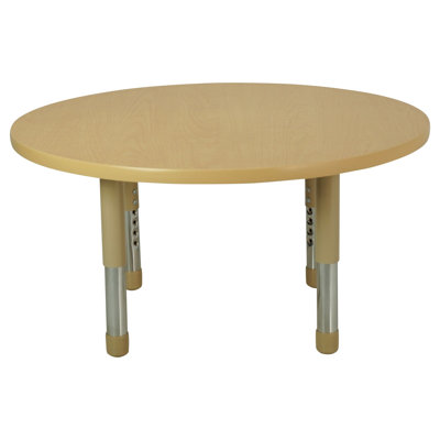Table ronde avec moules en T et pattes minuscules réglables