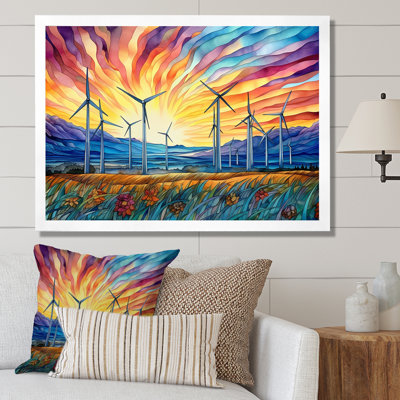 Éoliennes au lever du soleil
