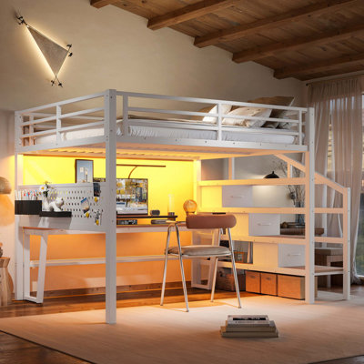 Lit mezzanine peu encombrant avec escalier de rangement et bureau mobile
