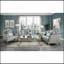 Table basse champagne avec des courbes gracieuses et des motifs floraux complexes