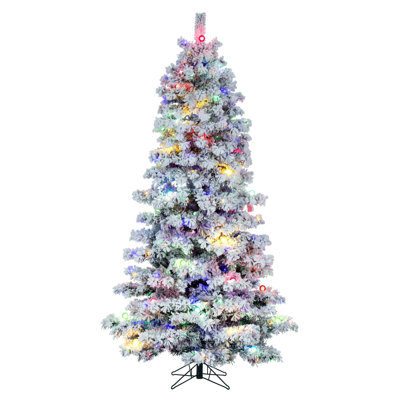  12' x 74" Flocked Slim Alaskan Artificial Pre-Lit Christmas Tree with 91 Multi-Colored G40 and 1450 Multi-Colored LED Mini Lights, 3774 Flocked Realistic PVC Tips, 6' Step On/Off Power Cord and Folding Metal Tree Stand. Assembly is required.