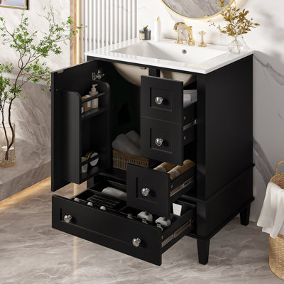 24-Inch Bathroom Vanity With An Integrated Ceramic Basin, Featuring A Door-Mounted Double-Layer Shelf, Soft-Close Drawers, And A Soft-Close Cabinet Door.