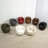Chryssi Faux Leather Swivel Barrel Chair-223788700