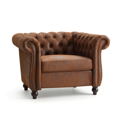 Fauteuil d'appoint Camberley traditionnel capitonné avec dossier Chesterfield et accoudoirs arrondis, idéal pour le salon et le bureau.