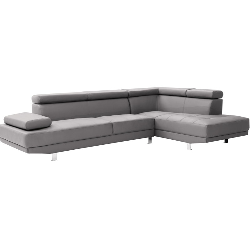 Canapé modulaire gris avec méridienne orientée vers la droite, accoudoirs réglables et pieds en acier, coussins en mousse, repose-pieds moderne pour une détente idéale et durable