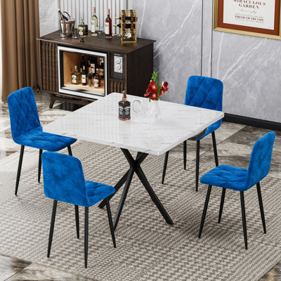 Ensemble de 4 chaises de salle à manger, siège rembourré en velours bleu et supports en métal, design moderne, 4 chaises intégrées, coussin confortable, usage polyvalent