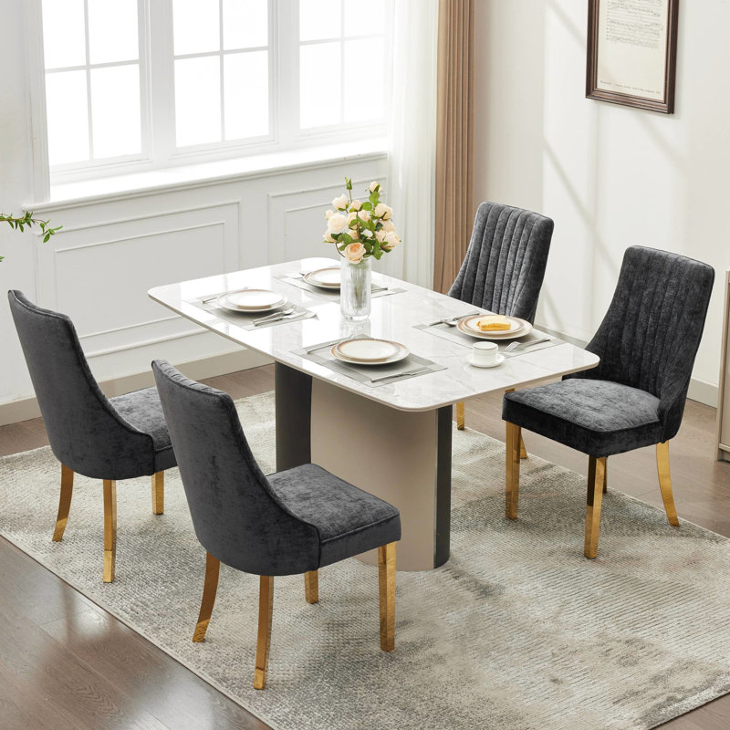 Chaises de salle à manger en rayonne recouvertes de tissu de rayonne avec dossier noir et 2 pattes plaquées en acier inoxydable doré pour un raffinement traditionnel et confortable
