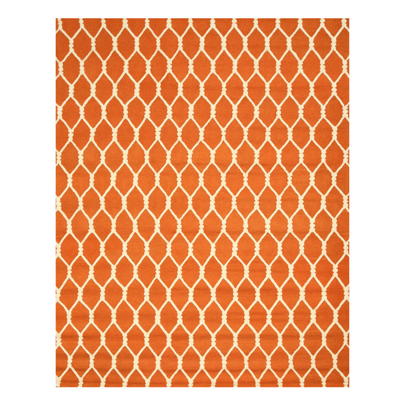 Tapis orange en laine touffeté à motif géométrique