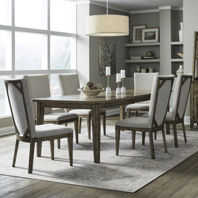 Gertraute Rectangular Dining Table Set w/ 6 Upholstered Chairs