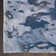 Tapis bleu abstrait touffeté