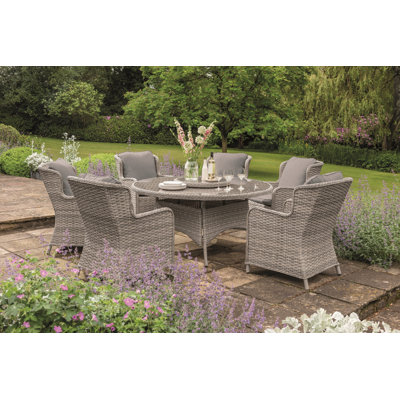 Hurd 6 - Person Wicker Patio Dining Set with Round Table , Cushions Included