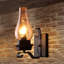 Lampe murale en métal et verre