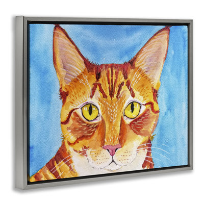 Chat audacieux sur cadre flottant bleu, conception par Tatiana Roberts