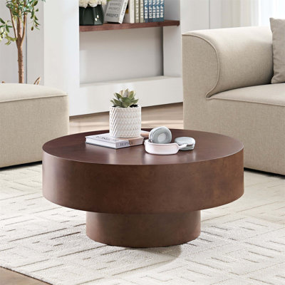 Table basse ronde en faux bois de ronce de placage avec piédestal robuste pour les espaces compacts, idéale pour les salons et les appartements modernes