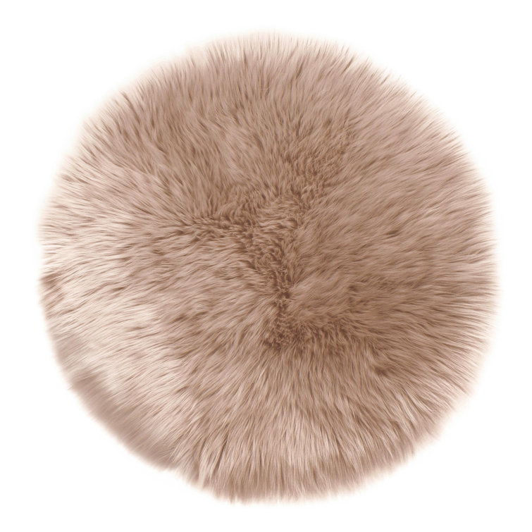 Round Lianet Solid Color Machine Woven Faux Sheepskin Area Rug in Beige
