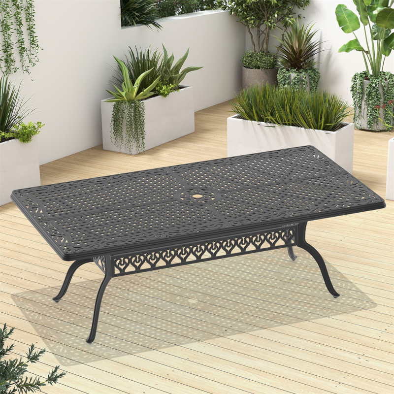 Table de salle à manger élégante en fonte d'aluminium pour les rassemblements en plein air et la détente
