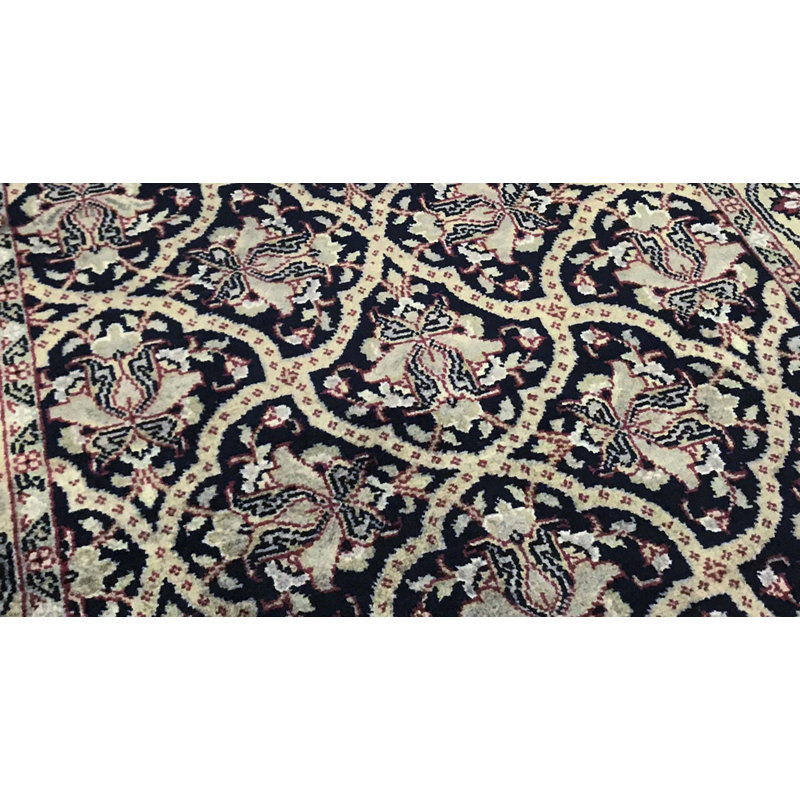 Tapis noir et doré de haute qualité noué à la main