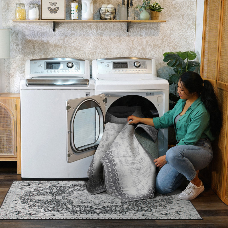 Gray Bordered 5' x 7' Washable Synthetic Rug
