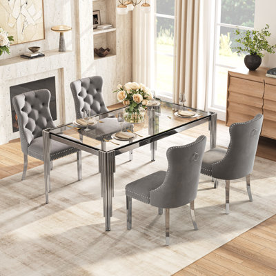 Ensemble de salle à manger 65 "en verre de 5 pièces, table rectangulaire moderne en verre trempé avec pieds ronds irréguliers en acier inoxydable et 4 chaises de salle à manger rembourrées en velours avec garniture cloutée