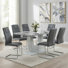 Holloman Modern 7-Piece Faux Marble Dining Set with Upholstered Cantilever Chairs