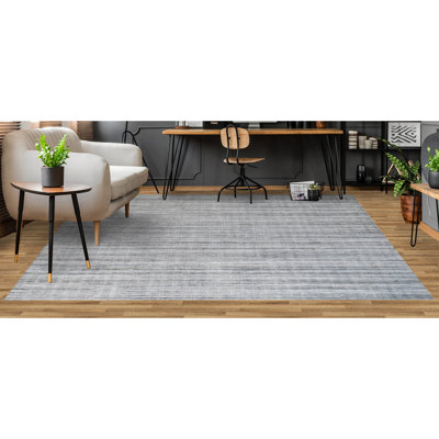 Tapis rayé synthétique noué à la main gris / bleu