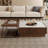 A mid-style walnut-colored coffee table set