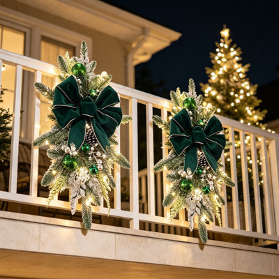 set of 2 Pre‑Lit Christmas Teardrop Swag Door Hanger, 23.6"x11.8" Artificial Holiday Swag with Velvet Bow,  Baubles & Pinecones, Battery Operated for Front Door, Stair Railing, Indoor Covered Outdoor, Housewarming Gift