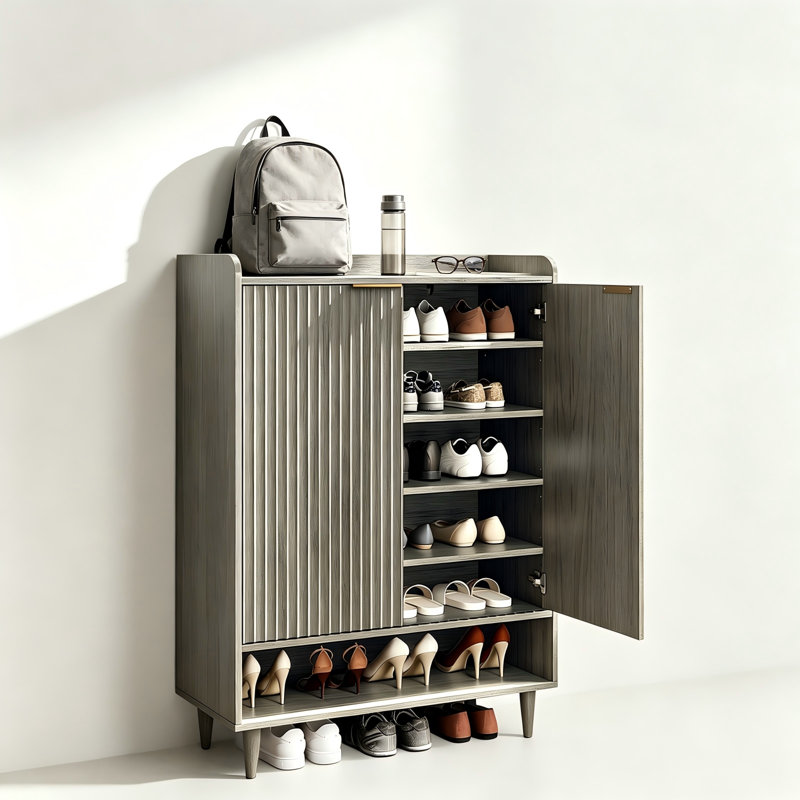 Meuble à chaussures 80,3 cm x 36 cm x 106,6 cm, panneau mélamine MDF, monobloc, 2 portes, barre supérieure, 1 tablette, pattes coniques en chêne gris.
