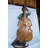 Boy playing cello large bronze statue -  Size: 19"L x 22"W x 59"H.