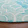 Tapis ivoire / turquoise en laine touffeté à la main à motif géométrique
