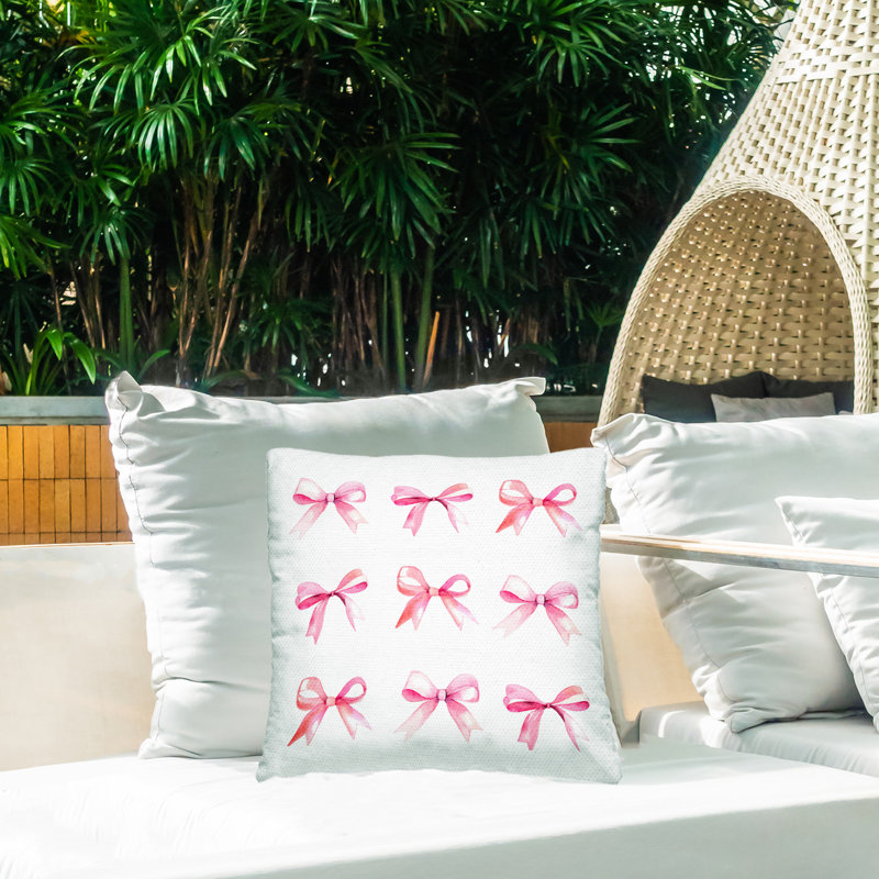 Coussin décoratif d'extérieur à motif d'arc rose par Daphne Polselli