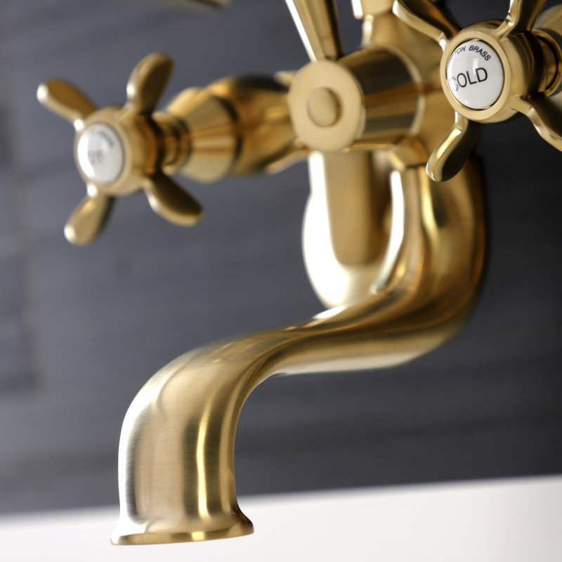 Kingston Brass Essex Three-Handle 2-Hole Wall Mount Clawfoot Tub Faucet with Handshower, Brushed Brass