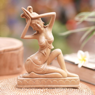 Sculpture priant
